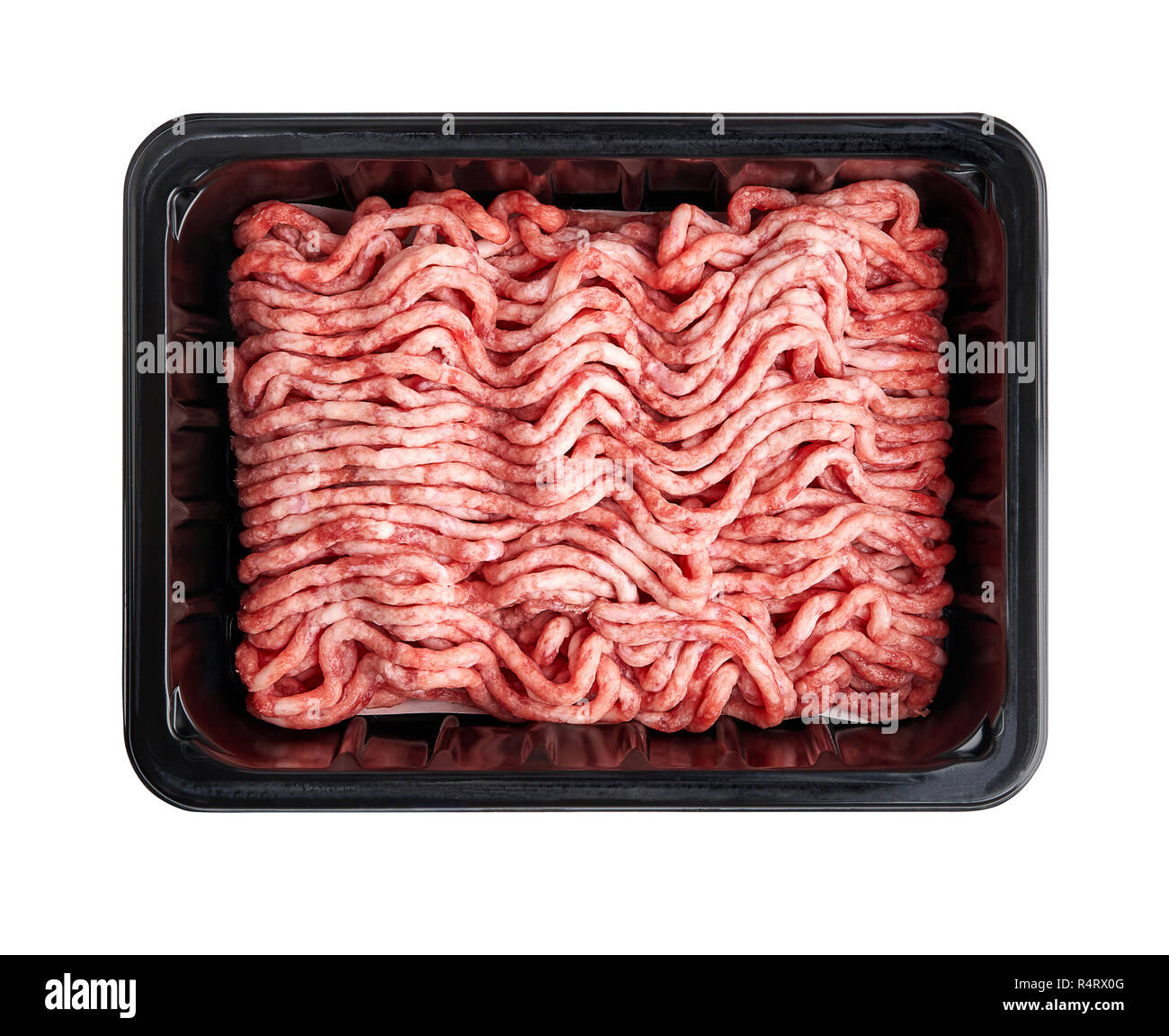 Kunststoff schwarz Tablett mit frischem Schweinefleisch rohes Hackfleisch auf weißem Hintergrund. Das Design der Verpackung für Mock up. Stockfoto