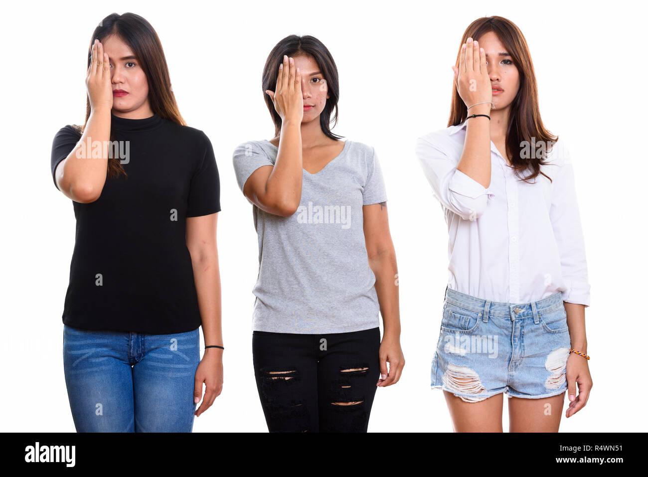 Studio geschossen von drei junge asiatische Frau Freunde suchen betonte Stockfoto
