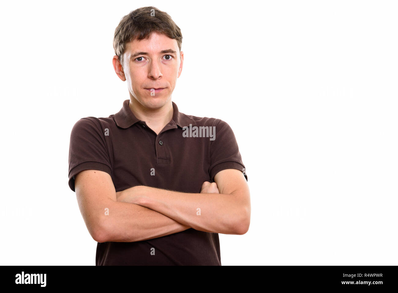 Studio shot der Mann mit verschränkten Armen Stockfoto