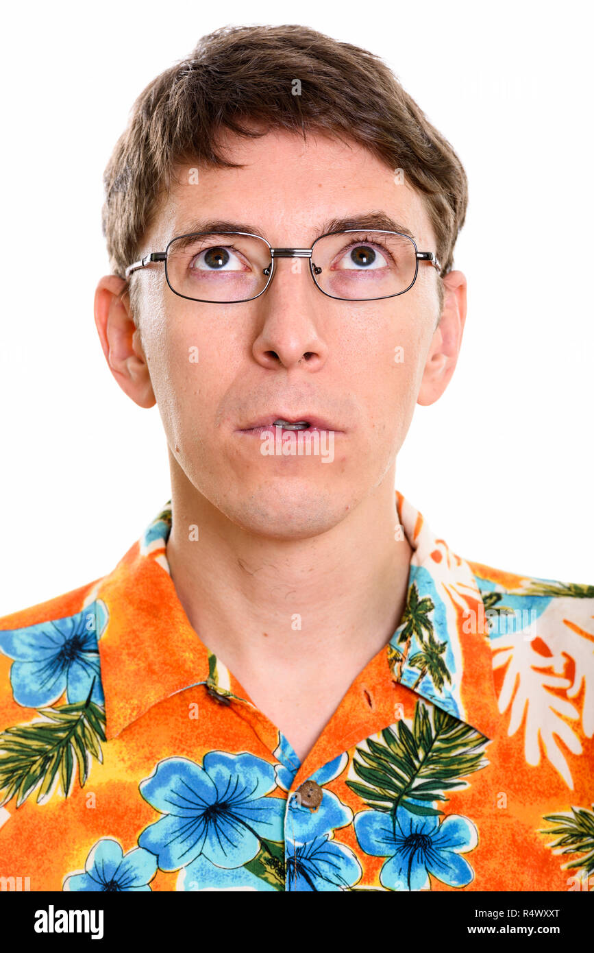 Gesicht des Menschen denken beim Tragen von Hawaiian Shirt Stockfoto