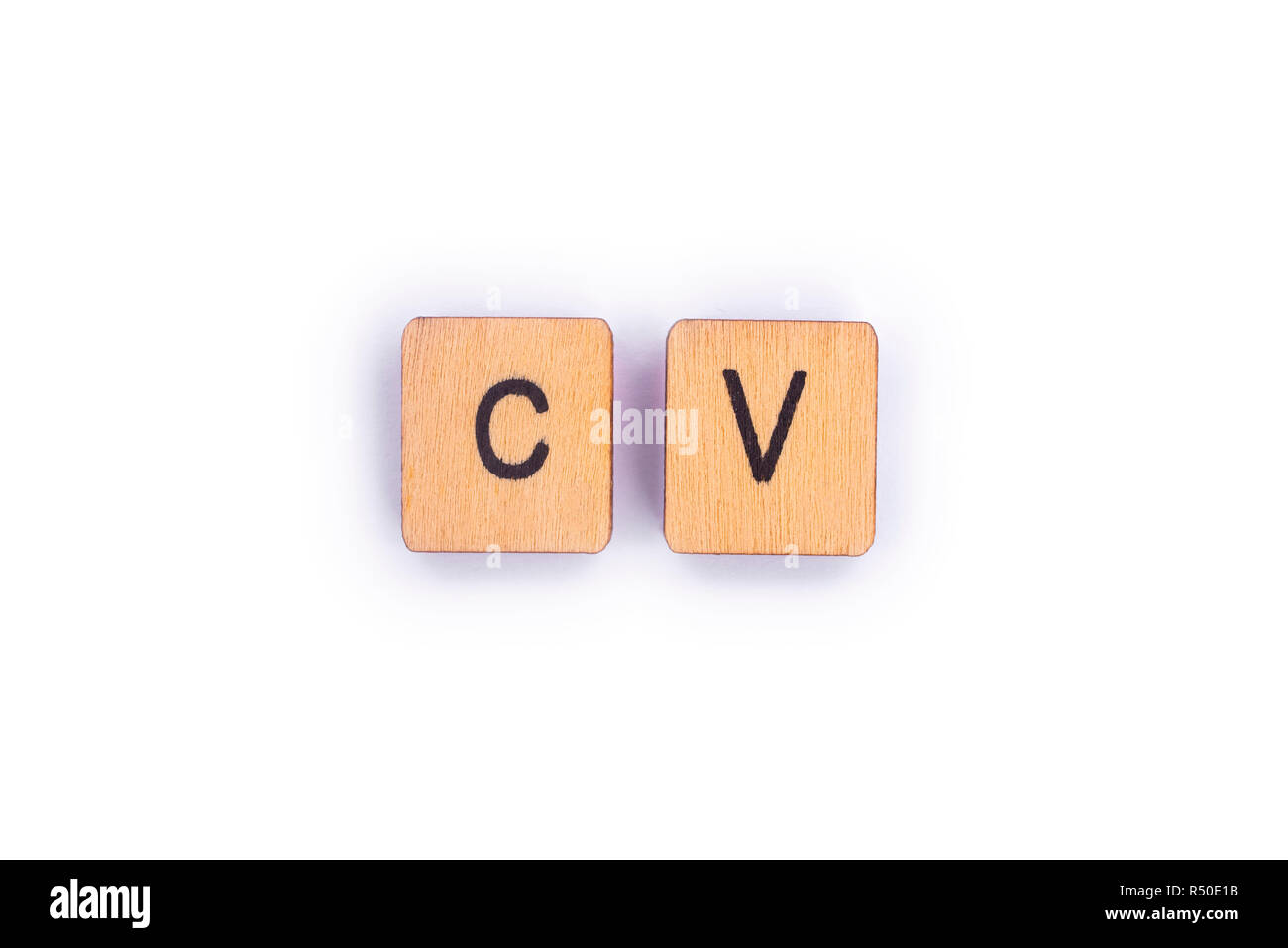 Die Abkürzung CV - Curriculum Vitae, Dinkel mit hölzernen Buchstabensteine. Stockfoto