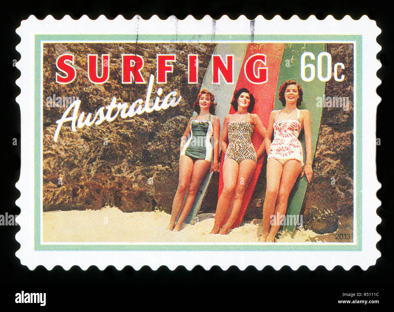 Australien - ca. 2013: Eine Briefmarke gedruckt in Australien gewidmet Surfen, zeigt Strandschönheiten, ca. 2013 Stockfoto