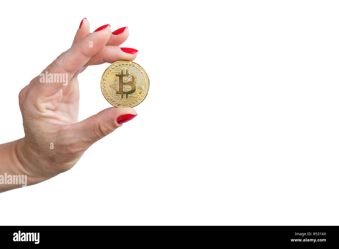Virtuelles Geld goldene bitcoin Frauen hand mit Rote nägel Finger auf weißem Hintergrund Stockfoto