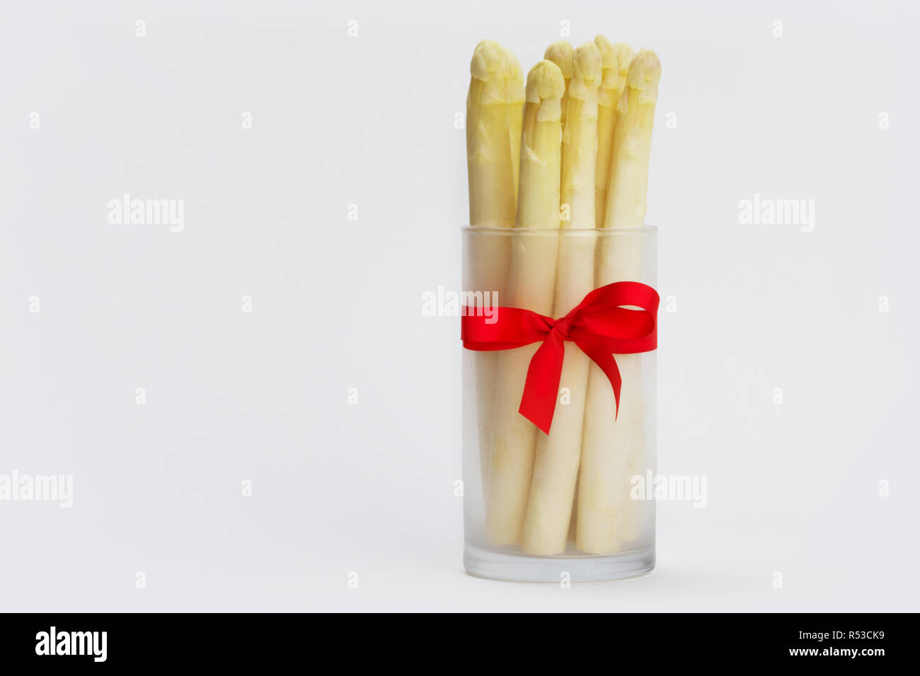 Spargel im Glas Stockfoto