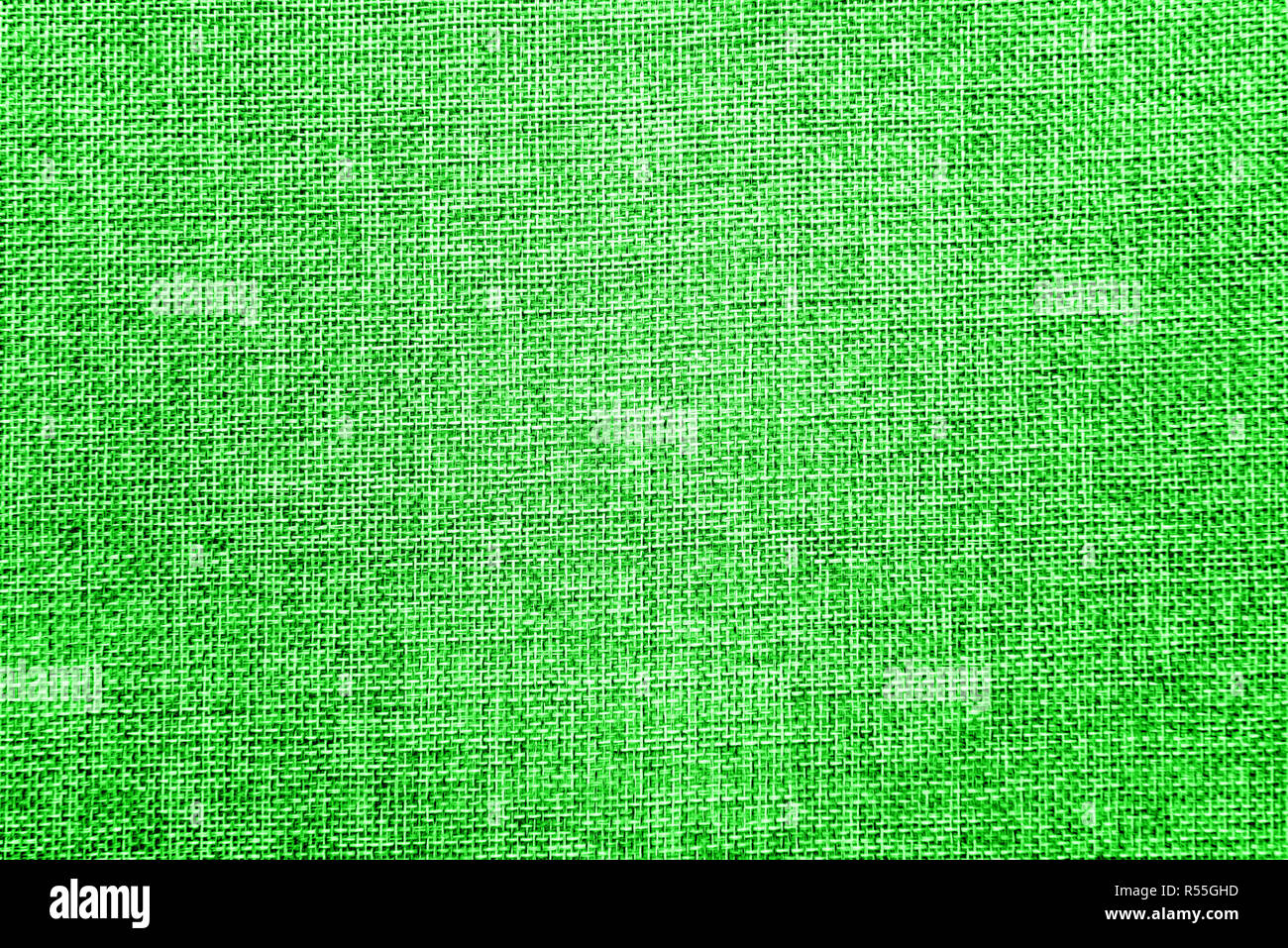 Leere abstrakt Hintergrund mit natürlichen Sackleinen detaillierte Textur. Ökologie freundlich grobe Gewebe threads farbig in Mischung aus hellem elektrischem Grün #32 CD3 Stockfoto