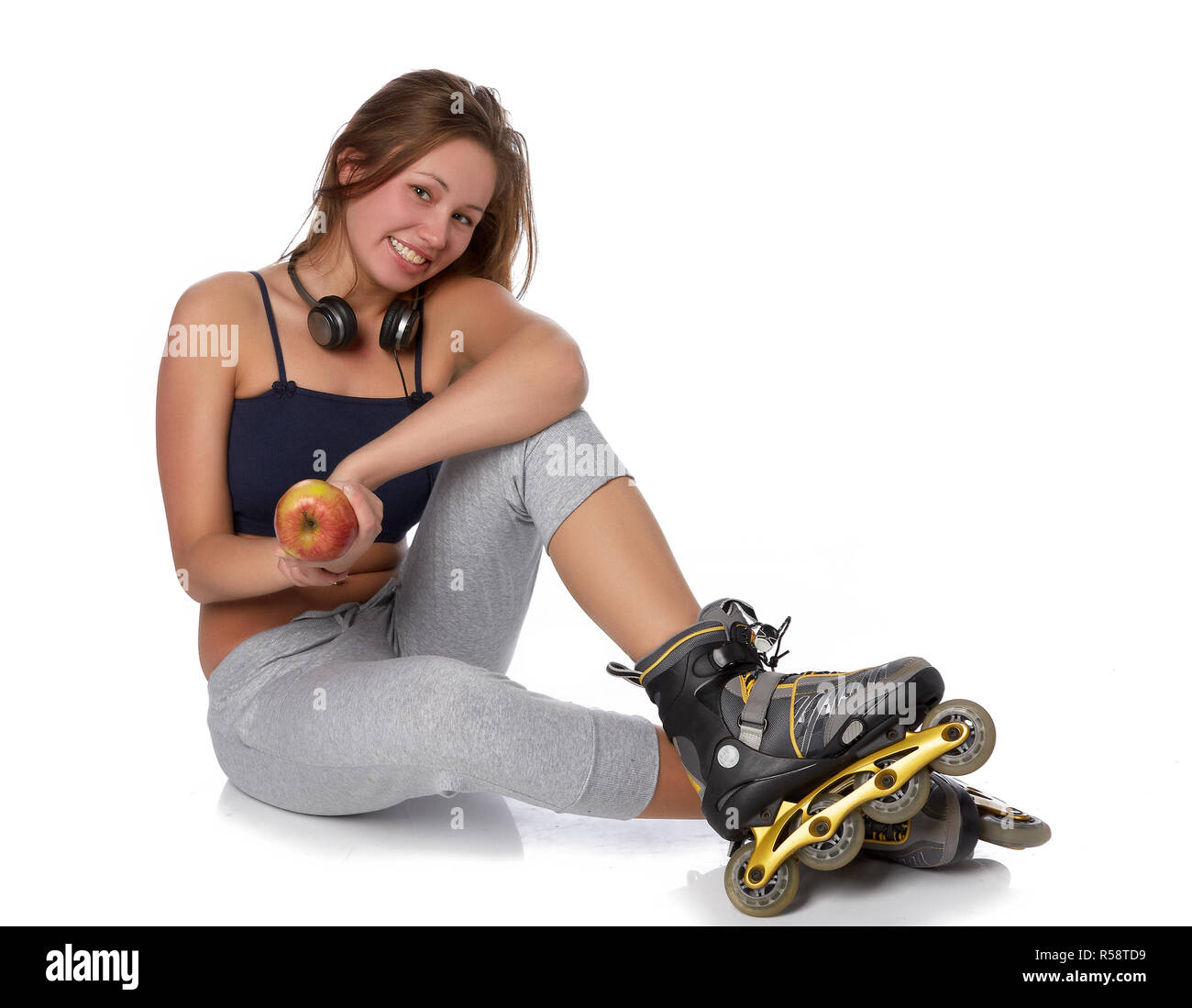 Das schöne Mädchen in rollerskates Stockfoto