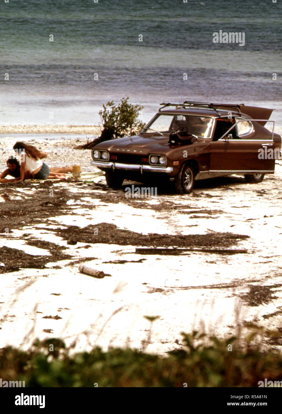 Touristen auf dem öffentlichen Strand von Key West. 1975 Stockfoto