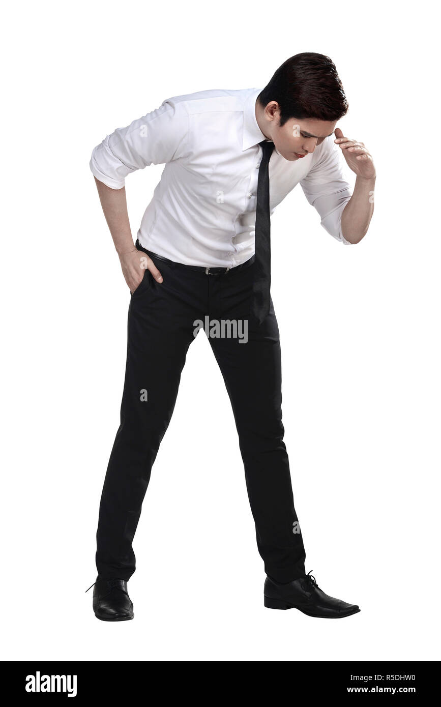 Asian Business Mann schauen nach unten etwas seaarching Stockfoto