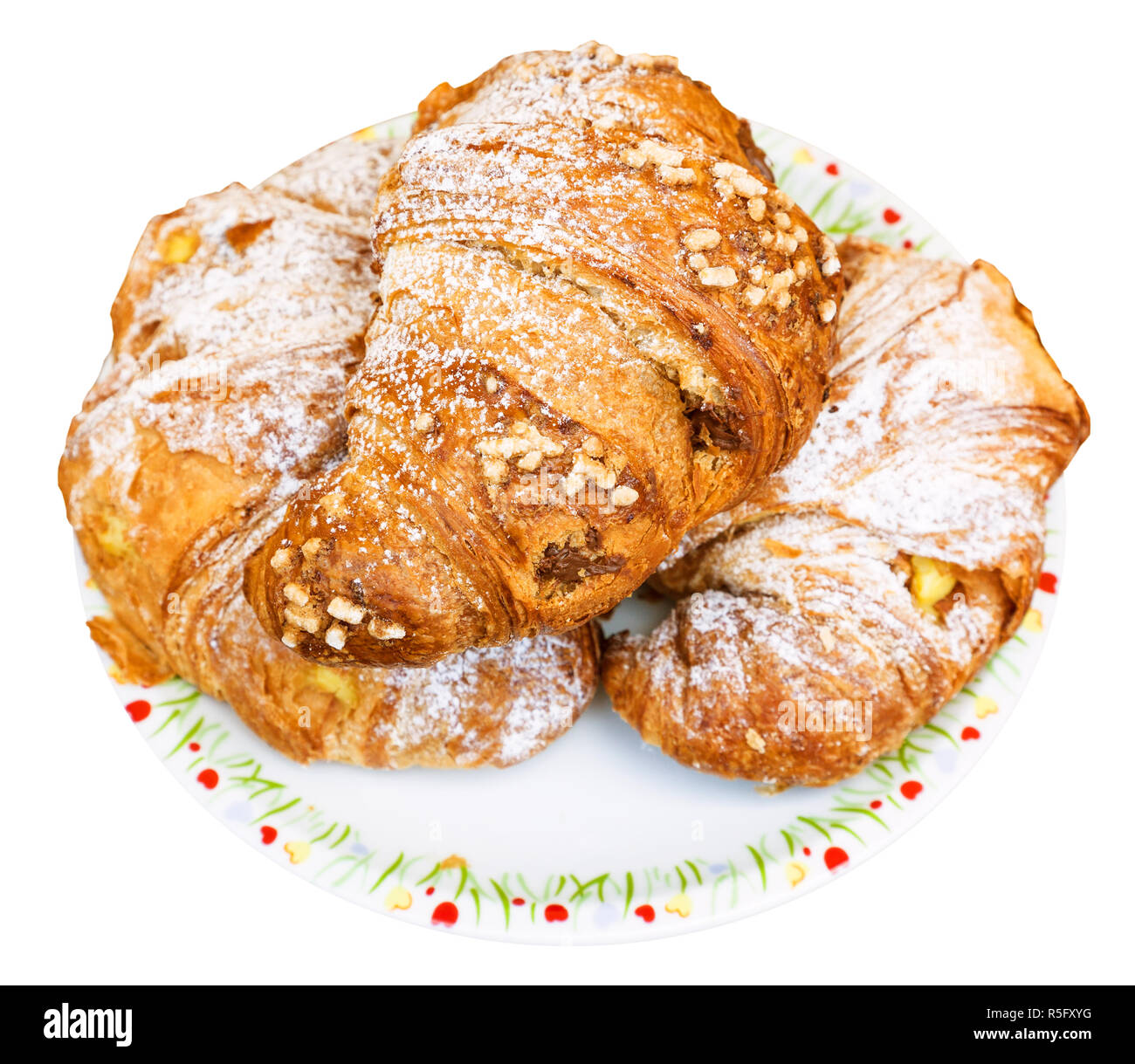 Drei frische Croissants auf Platte Stockfoto