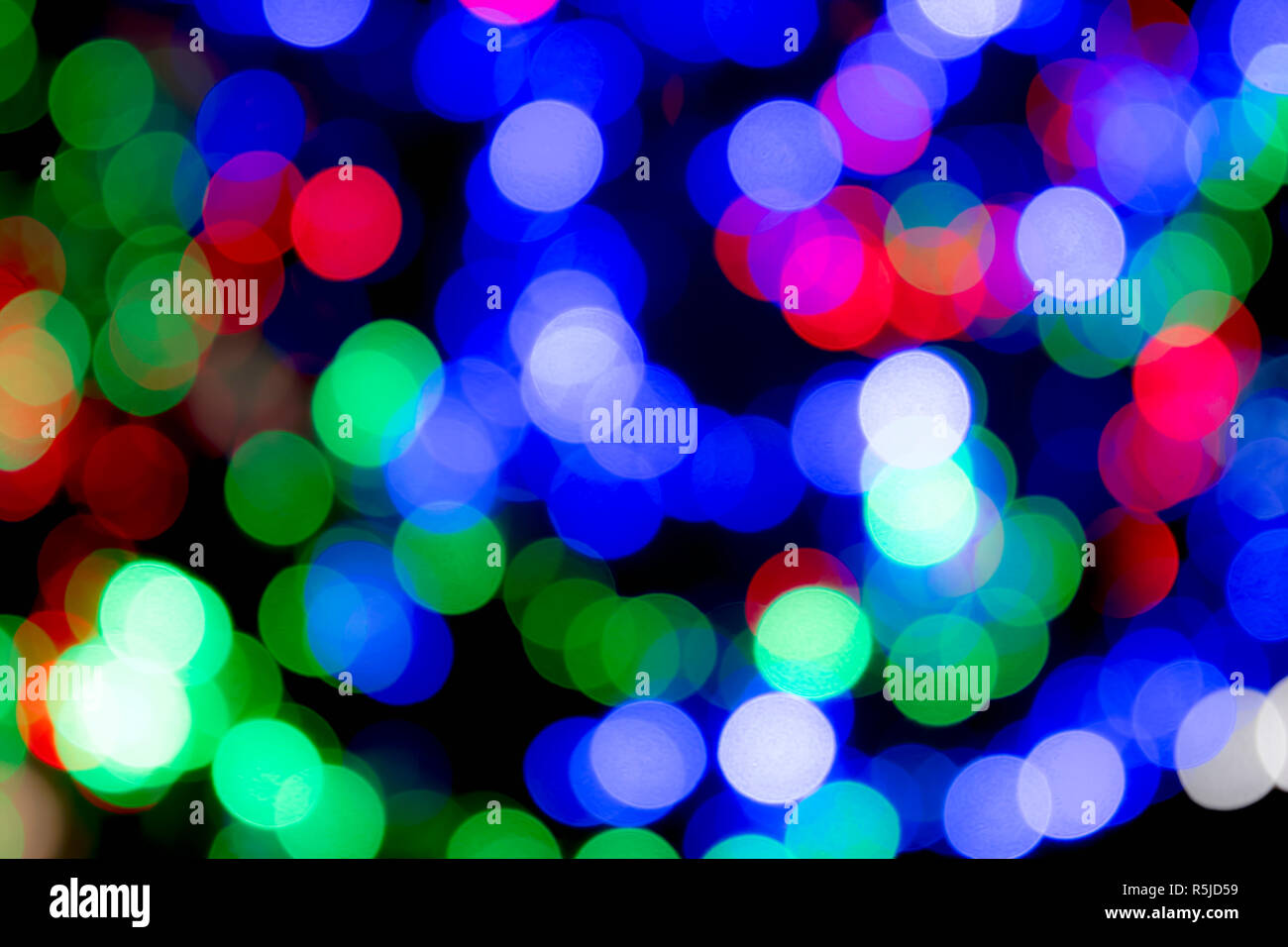 Weihnachten und festliche bunte Lichter, verschwommenes eine abstrakte Wirkung und bunte Weihnachten Hintergrund zu geben. Stockfoto