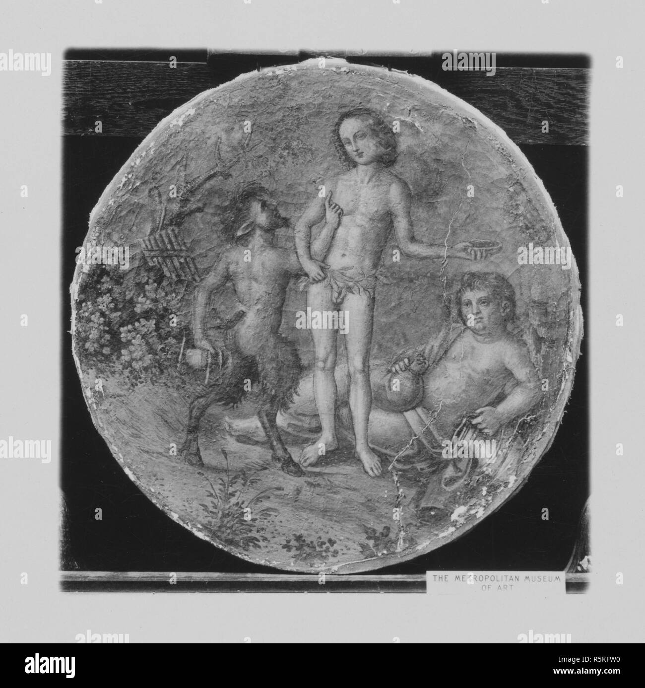 Bacchus, Pan und Silen. Artist: Pinturicchio (Italienisch, Perugia 1454-1513 Siena). Kultur: Italienisch, Umbrien. Abmessungen: Durchmesser: 19 cm. (49,2 cm). Datum: Ca. 1509. Eine der zwanzig - zwei Panels (14.114.1-.22) bilden die Decke aus dem Palast von Pandolfo Petrucci, genannt Il Magnifico, Siena. Die allgemeine Verteilung und Partition von der Decke aus, die von einem gewölbten abzuleiten und bemalte Decke in Neros goldenes Haus in Rom. Viele der einzelnen Figuren scheinen auch aus antiken Kunstwerke - vor allem Sarkophage abzuleiten. Museum: Metropolitan Museum of Art, New York, USA. Stockfoto
