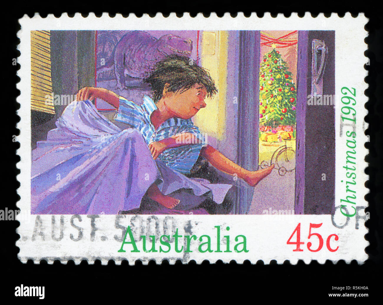 Australien - ca. 1992: einen Stempel in den Australien gedruckten zeigt Junge sprang vom Bett Weihnachten Morgen, Weihnachten, ca. 1992 Stockfoto