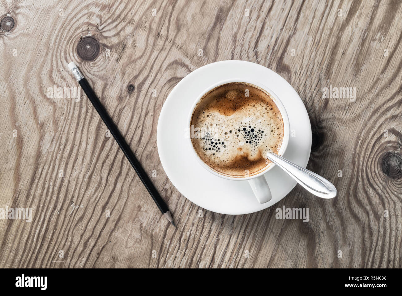 Kaffee und Bleistift Stockfoto