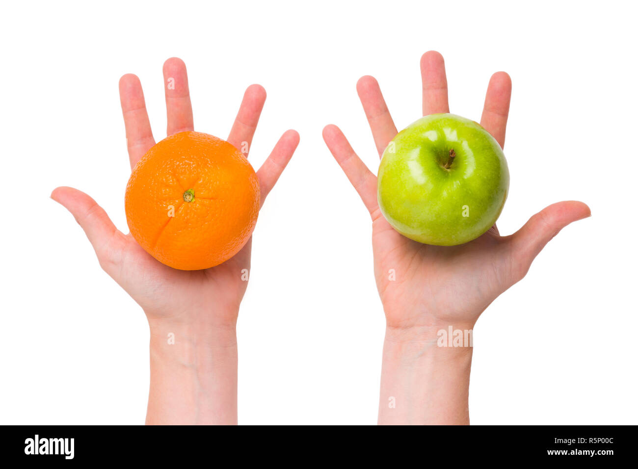 Vergleichen Sie Äpfel mit Orangen (Konzeptionelle) Stockfoto