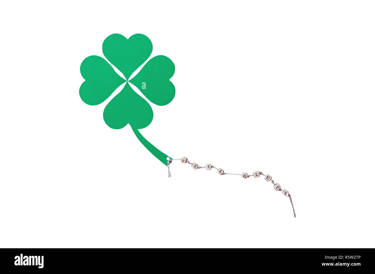 Die Worte, die Glück und ein Shamrock auf einer Schnur, Ausschneiden Stockfoto