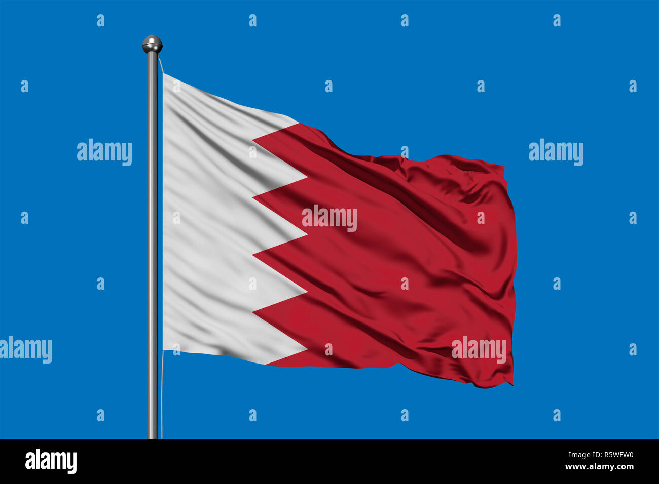 Flagge von Bahrain winken im Wind gegen den tiefblauen Himmel. Bahrainische Fahne. Stockfoto