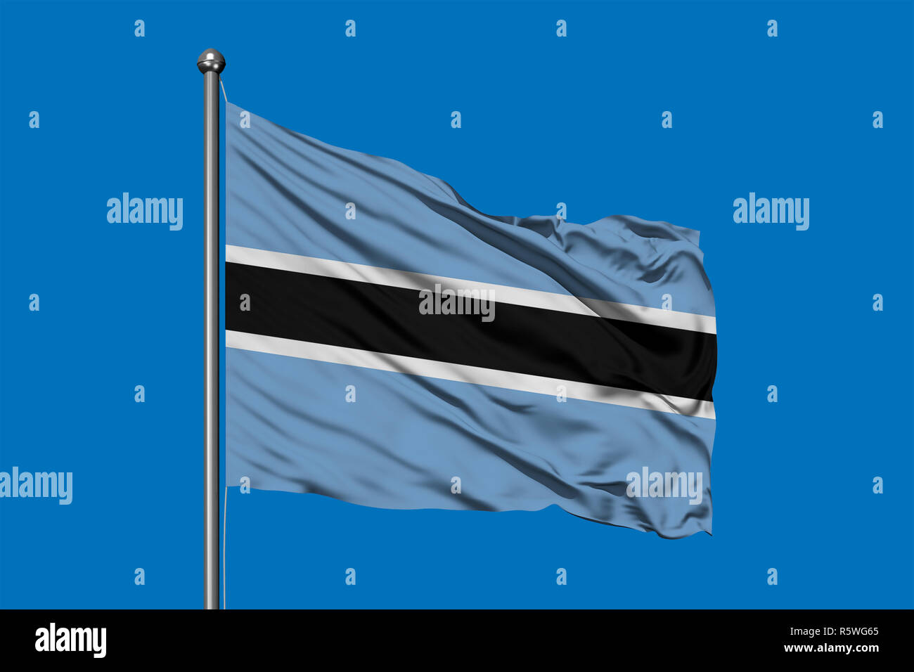 Flagge von Botswana im Wind gegen den tiefblauen Himmel. Botswanischen Flagge. Stockfoto