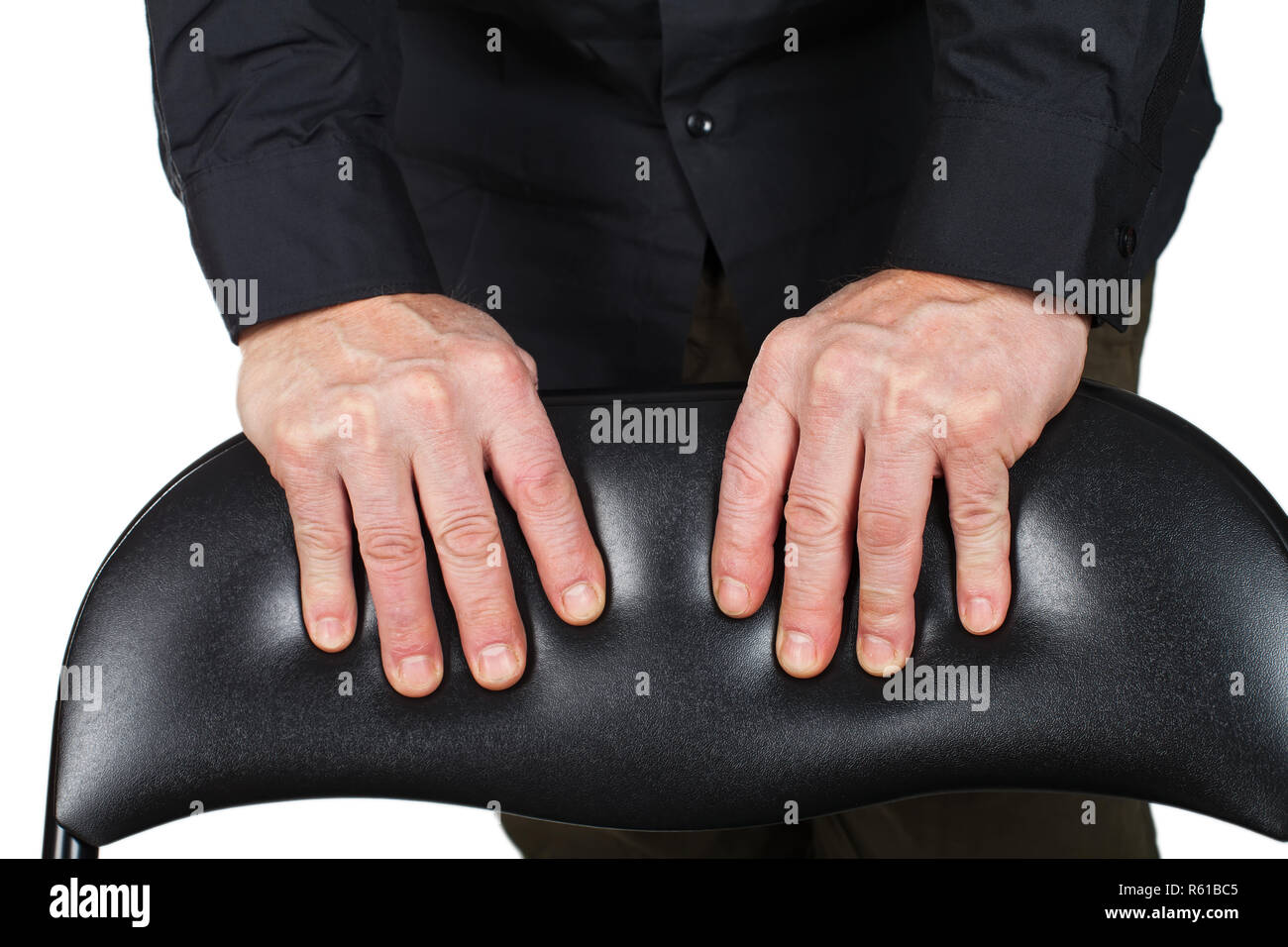 Foto von Hand ein älterer Mann auf einem Stuhl Stockfoto