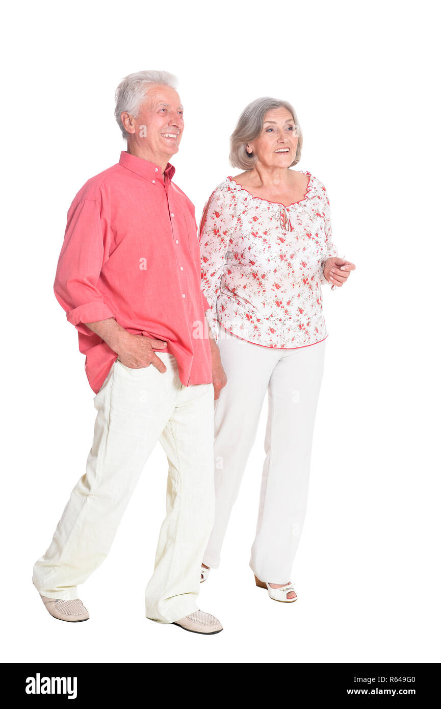 Portrait von Senior Paar, Hände auf weißem Hintergrund, volle Länge Stockfoto