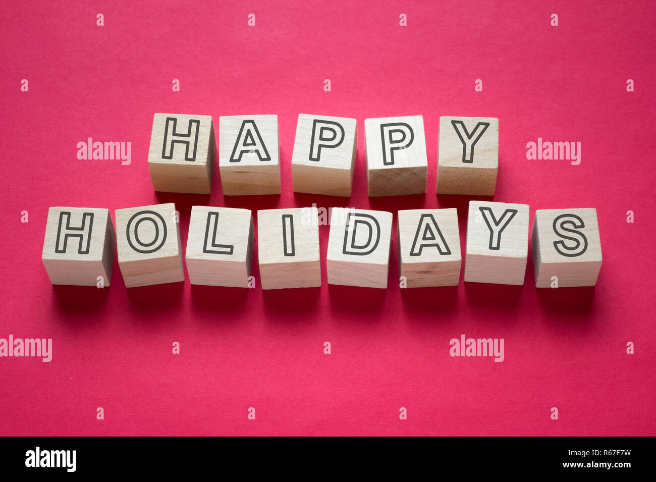 Happy Holidays Wort auf holzwürfel Stockfoto