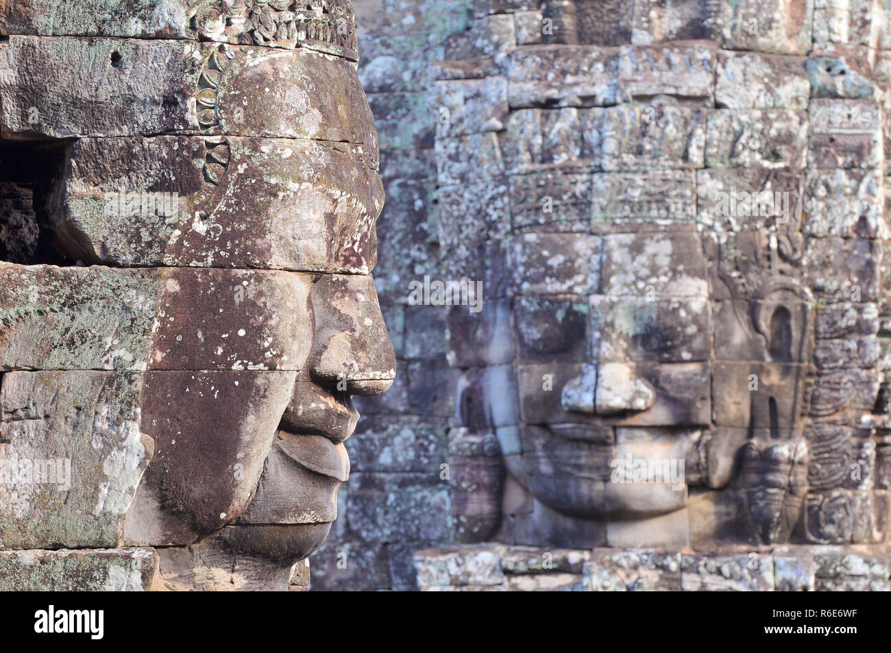 Buddha Köpfe Der Bayon Tempel in Angkor Thom, in der Nähe von Siem Reap, Kambodscha Stockfoto