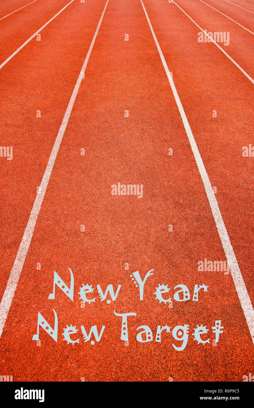 Neues Jahr, neue Ziel Konzept auf der Laufstrecke Hintergrund Stockfoto
