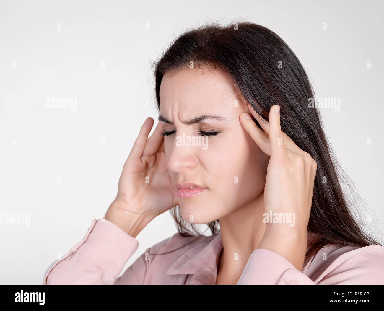 Geschäftsfrau hat Kopfschmerzen Stockfoto