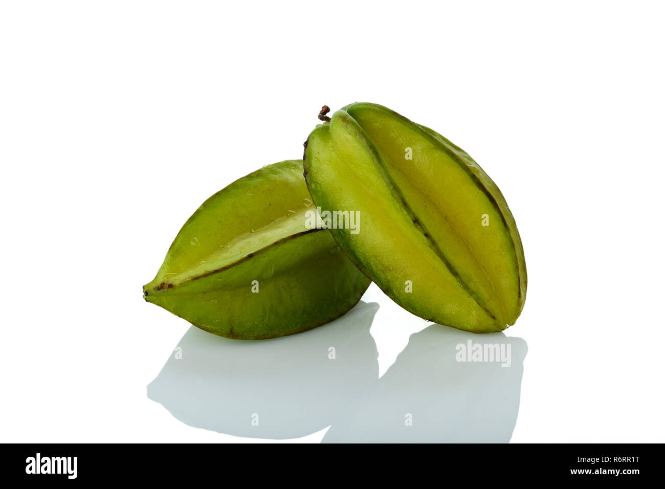 Frucht: Nahaufnahme von frischen grünen Star Fruit isoliert auf weißem Hintergrund Stockfoto