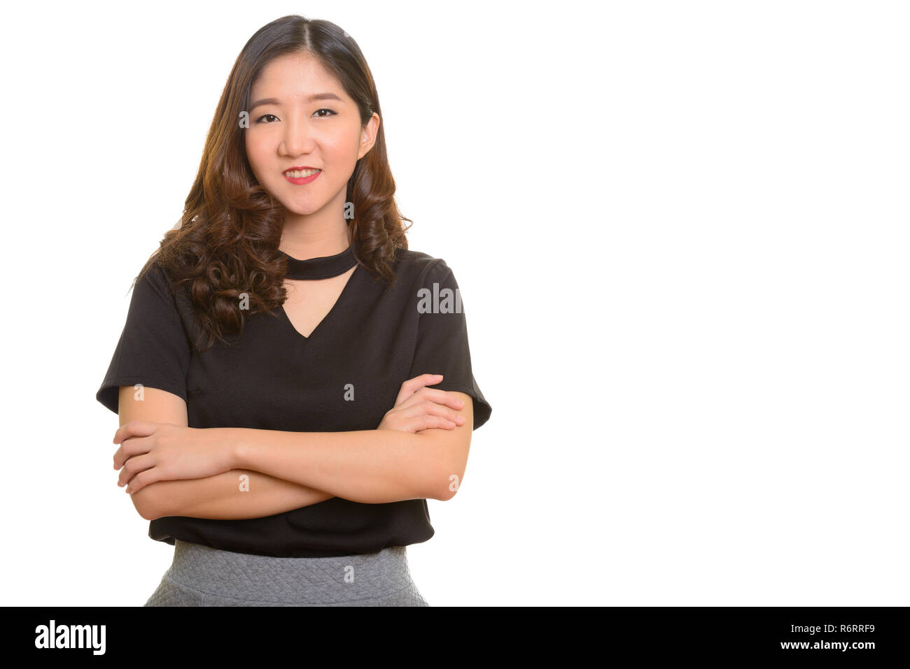 Porträt der jungen asiatischen Geschäftsfrau glücklich lächelnd Stockfoto