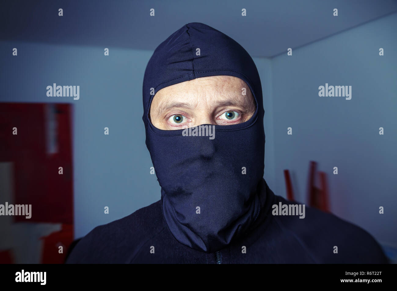 Einbrecher im Haus Stockfoto