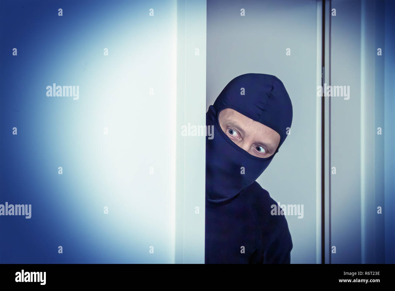 Einbrecher im Haus Stockfoto