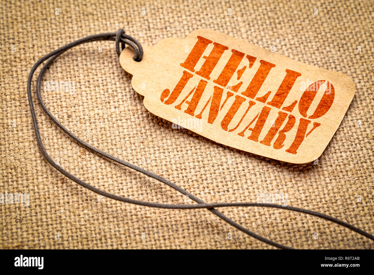 Hallo Januar - ein Papier Preis Variable mit einem Garn gegen Leinwand Leinwand Stockfoto