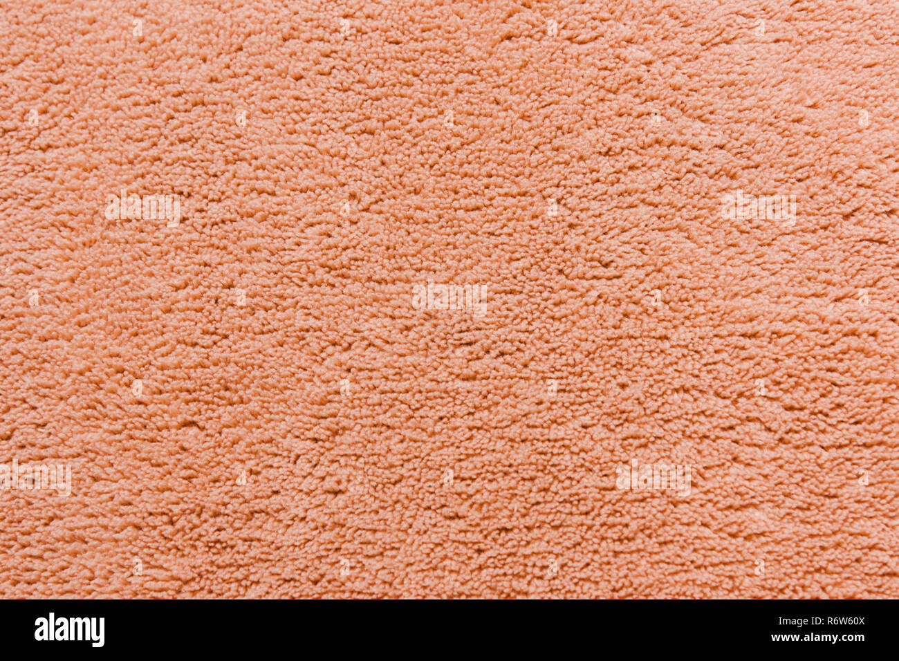 Beigefarbenen weichen Fleece Textur. Die Oberfläche einer Teddy mikrofaser Teppich Stockfoto