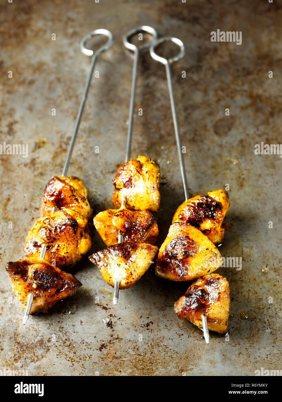 Rustikal golden gegrilltes Huhn Schwanz Stockfoto