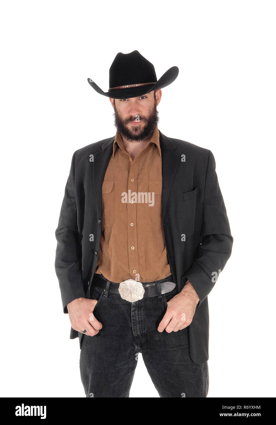 Mann im grauen Mantel und Cowboyhut, Hand in der Tasche Stockfoto
