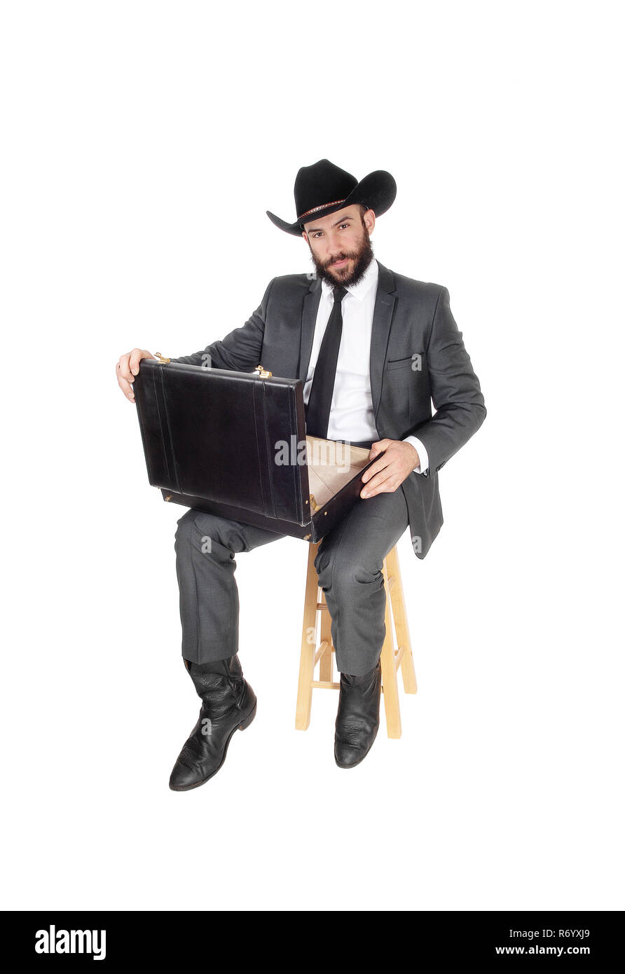 Business Mann in seine Aktentasche auf der Suche Stockfoto