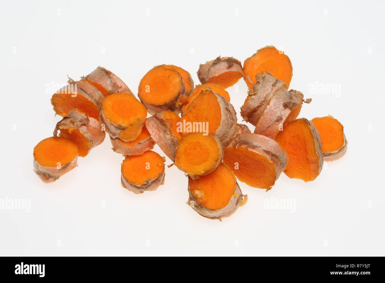 In Scheiben geschnitten Kurkuma Wurzel (Curcuma domestica) Stockfoto