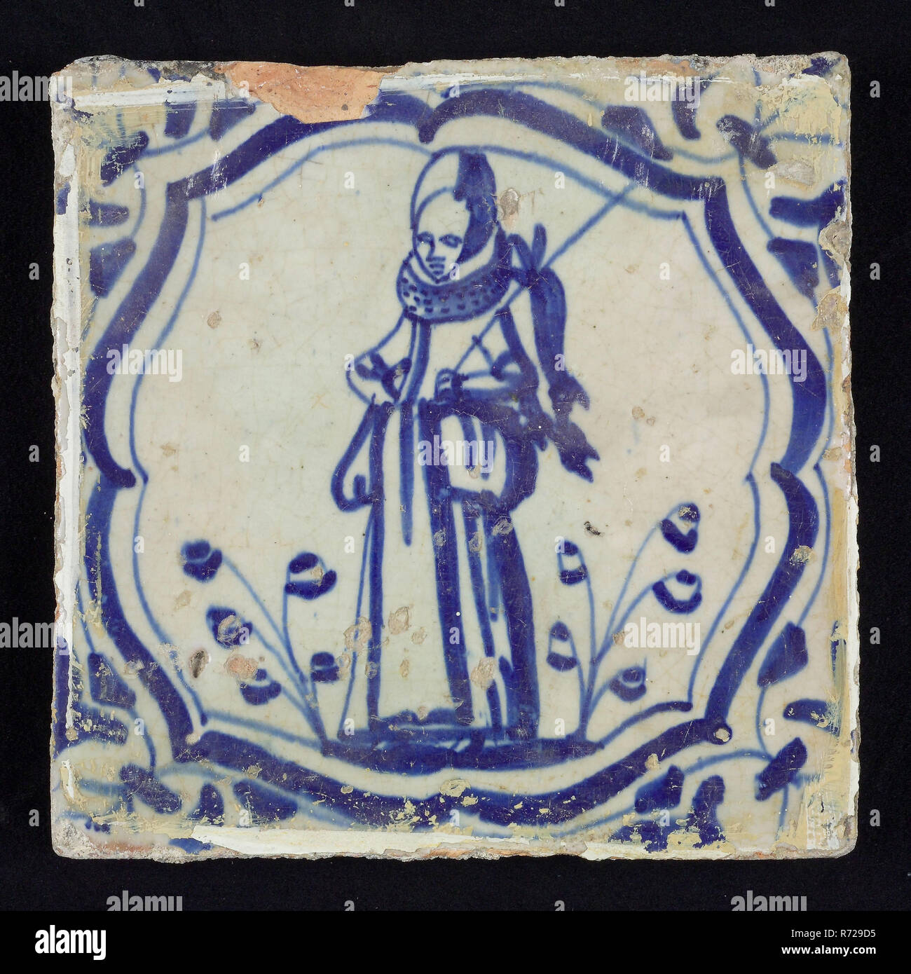 Abbildung Fliese, blau mit Jagd Szene mit Frau mit Personal mit toten Kaninchen, geschweifte Klammern mit Ecke Motiv, Wand Fliese Fliese skulptur keramik Steingut glasiert, gebackene 2 x Glasierte lackiert Stockfoto