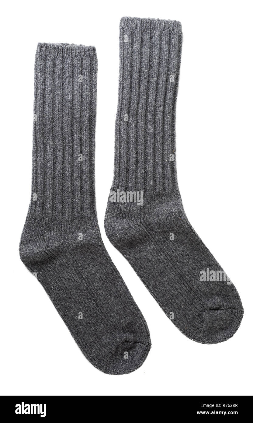Männer grau Wolle Socken auf Weiß. Stockfoto
