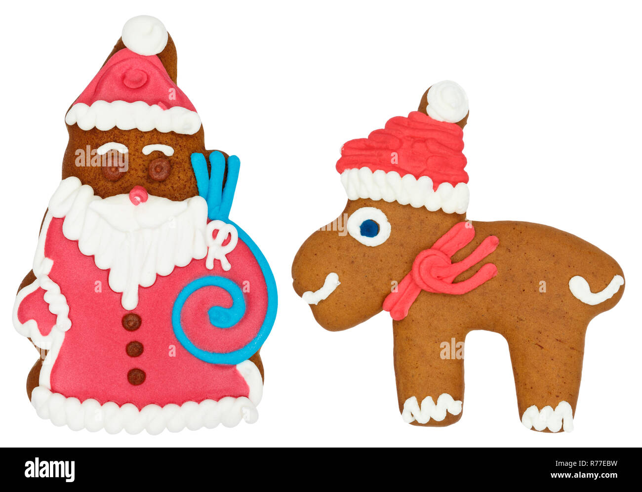 Weihnachtsmarkt Lebkuchen Weihnachtsmann mit Rentier Elch Elch essen Cookie auf weißem Hintergrund Stockfoto
