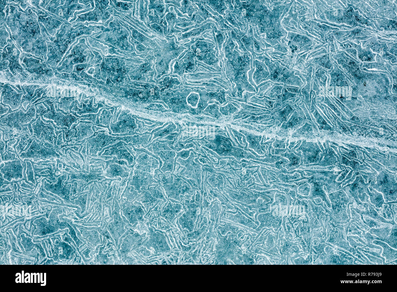Makro Blick auf Eis block Struktur Muster. Winter texturierter Hintergrund Stockfoto