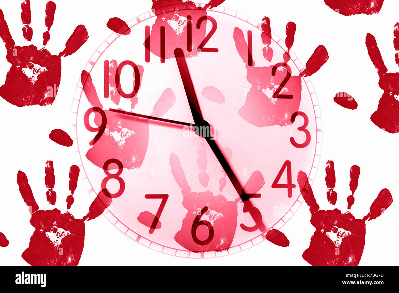 Uhr auf handprint Hintergrund Stockfoto