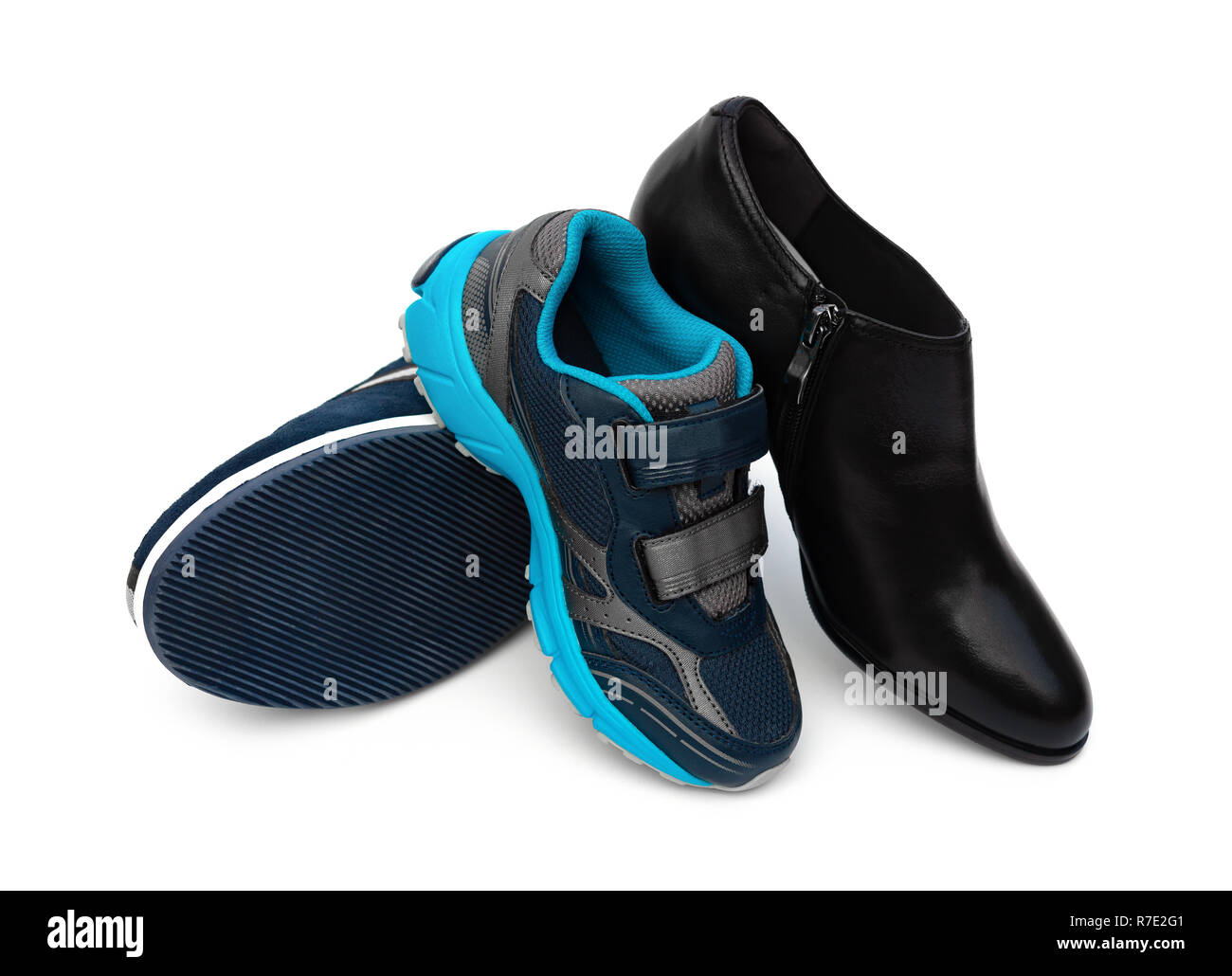 Schuhe für die ganze Familie Mitglied der Vater Mutter und Sohn auf Weiß Stockfoto