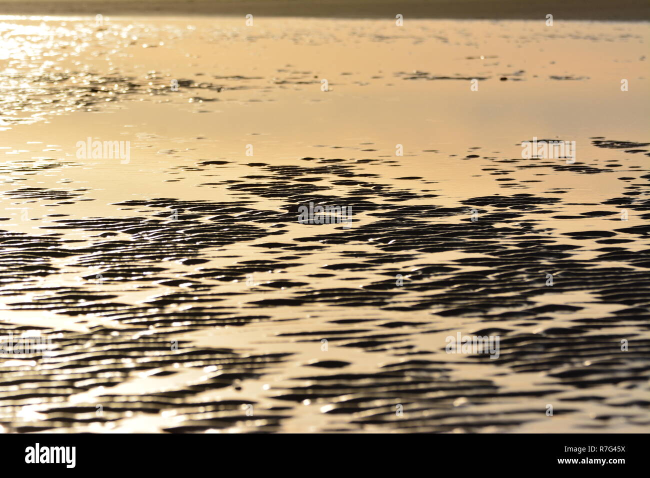 Stromschnellen mit Sonnenuntergang Reflexionen Stockfoto