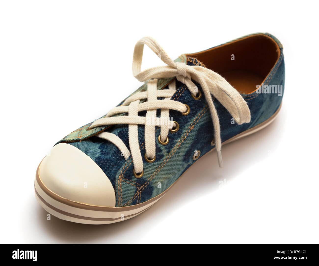 Teen jeans Turnschuhe isoliert auf einem weißen Stockfoto