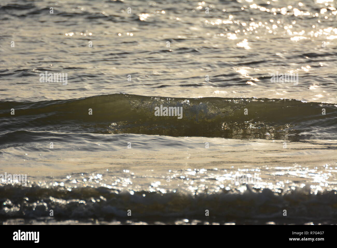 Abends Wellen, Blackrock Sands, North Wales Stockfoto