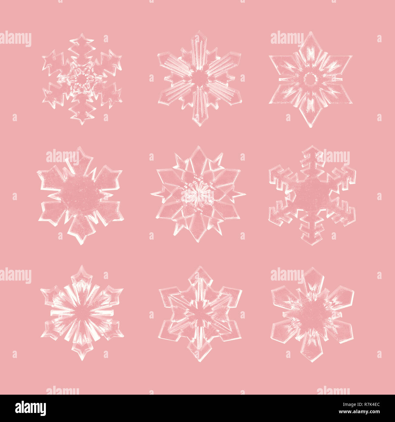 Realistische Weihnachten Schneeflocken auf Rose Gold Hintergrund isoliert. 3D-Rendering. Stockfoto