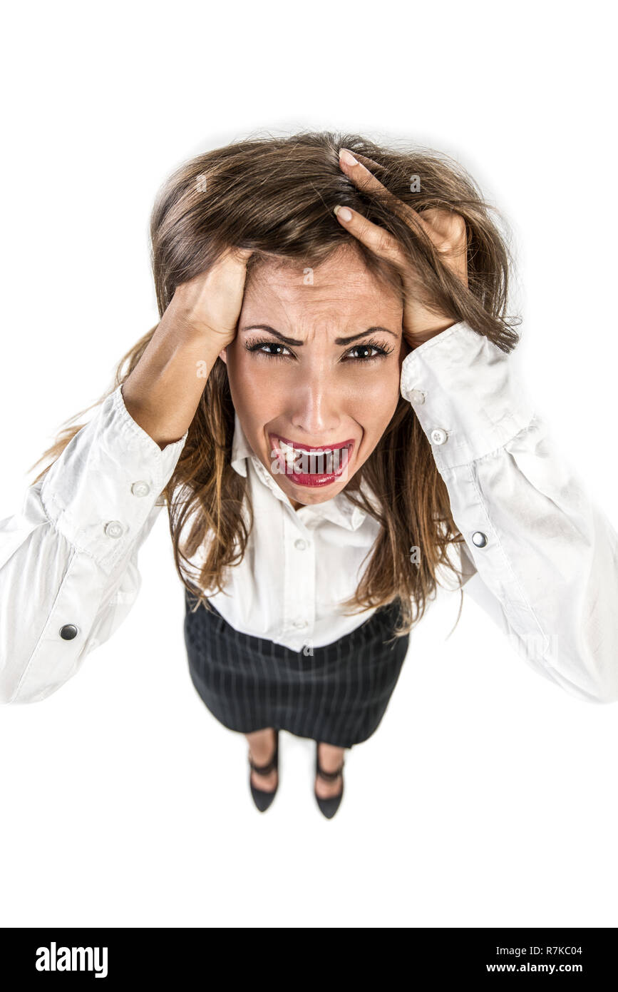 Junge Geschäftsfrau in Problem und betont ihr Haar ziehen. Stockfoto