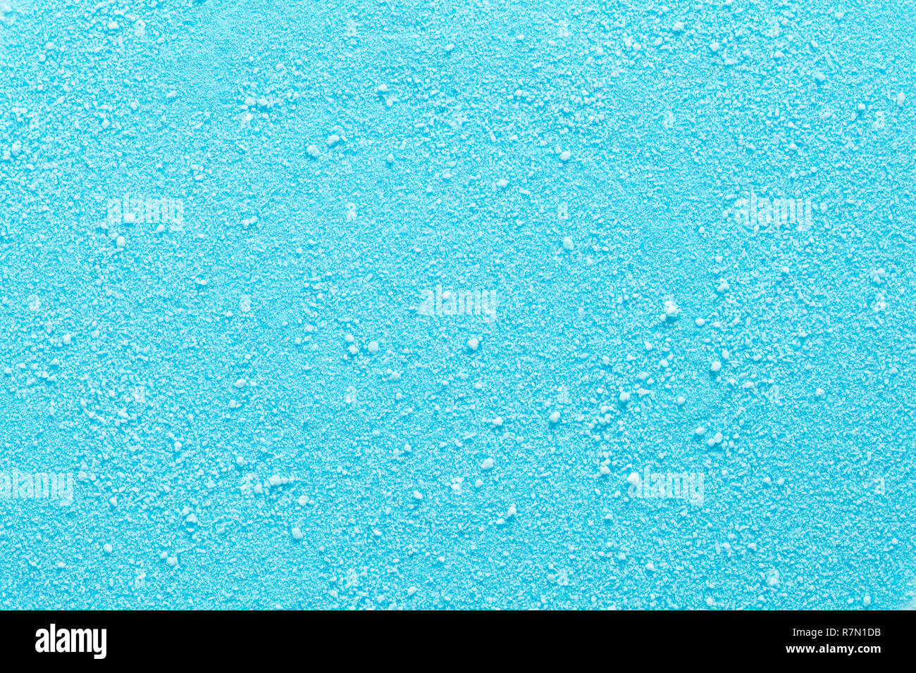 Blau granulierten Kandiszucker strukturierten Hintergrund schliessen. Stockfoto