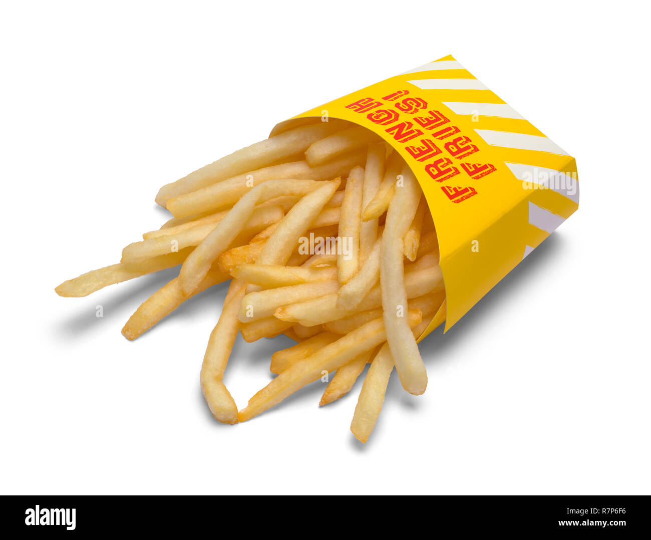 Über Box von Pommes Frites isoliert auf weißem Hintergrund. Stockfoto